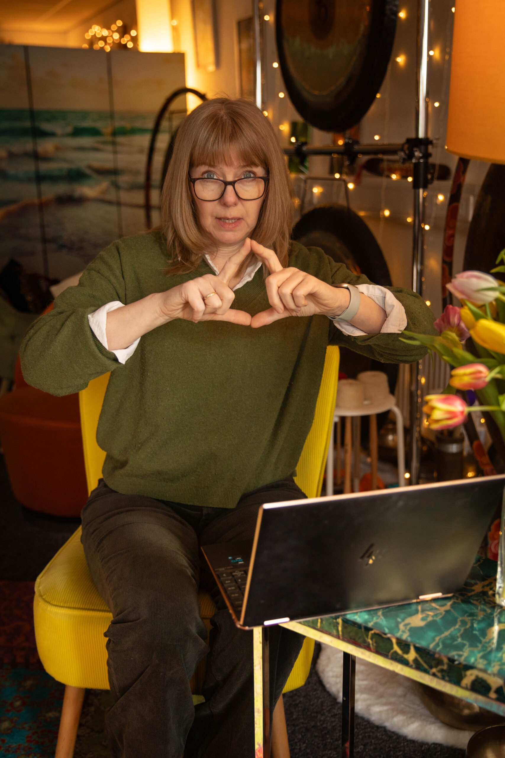 Carol, ADHD Coach, demonstrating the needs pyramid with hand gestures